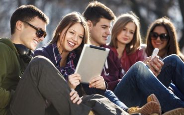 young-people-using-smartphones-and-tablets